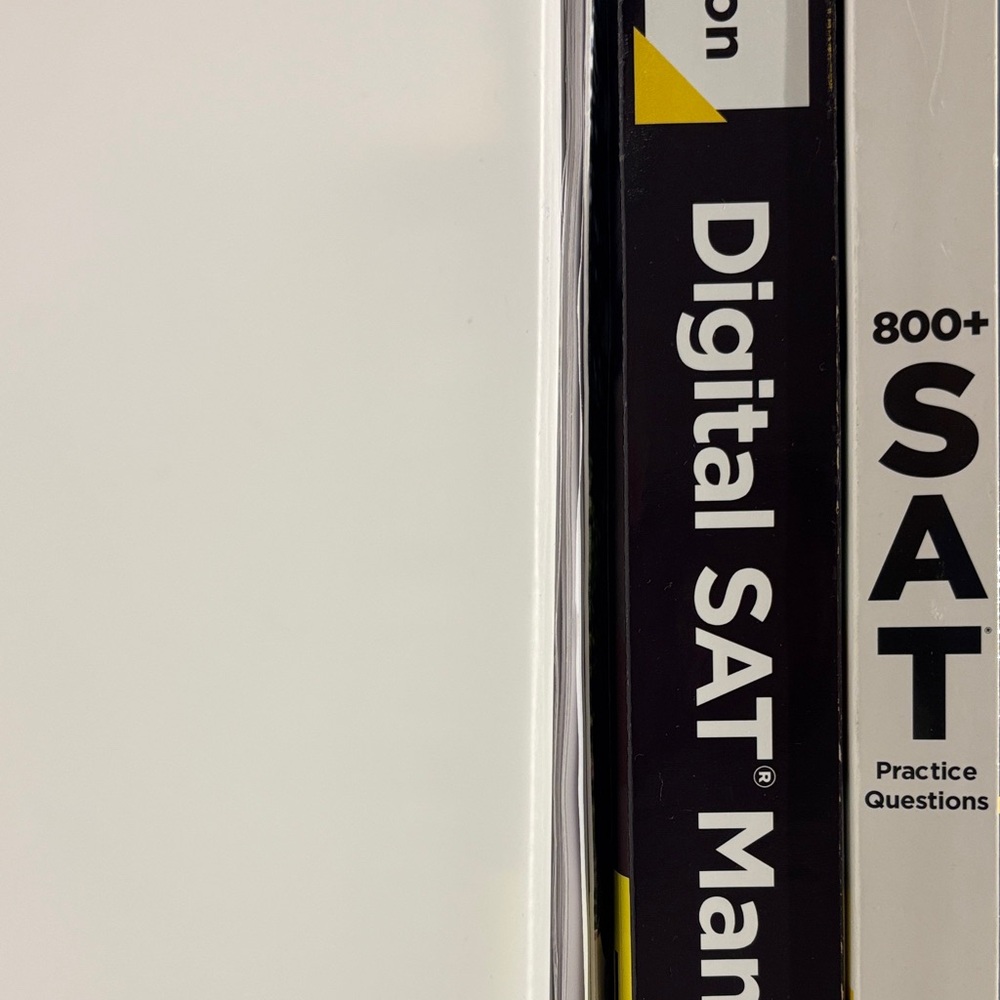 Kaplan SAT Prep Books with Yellow Highlights